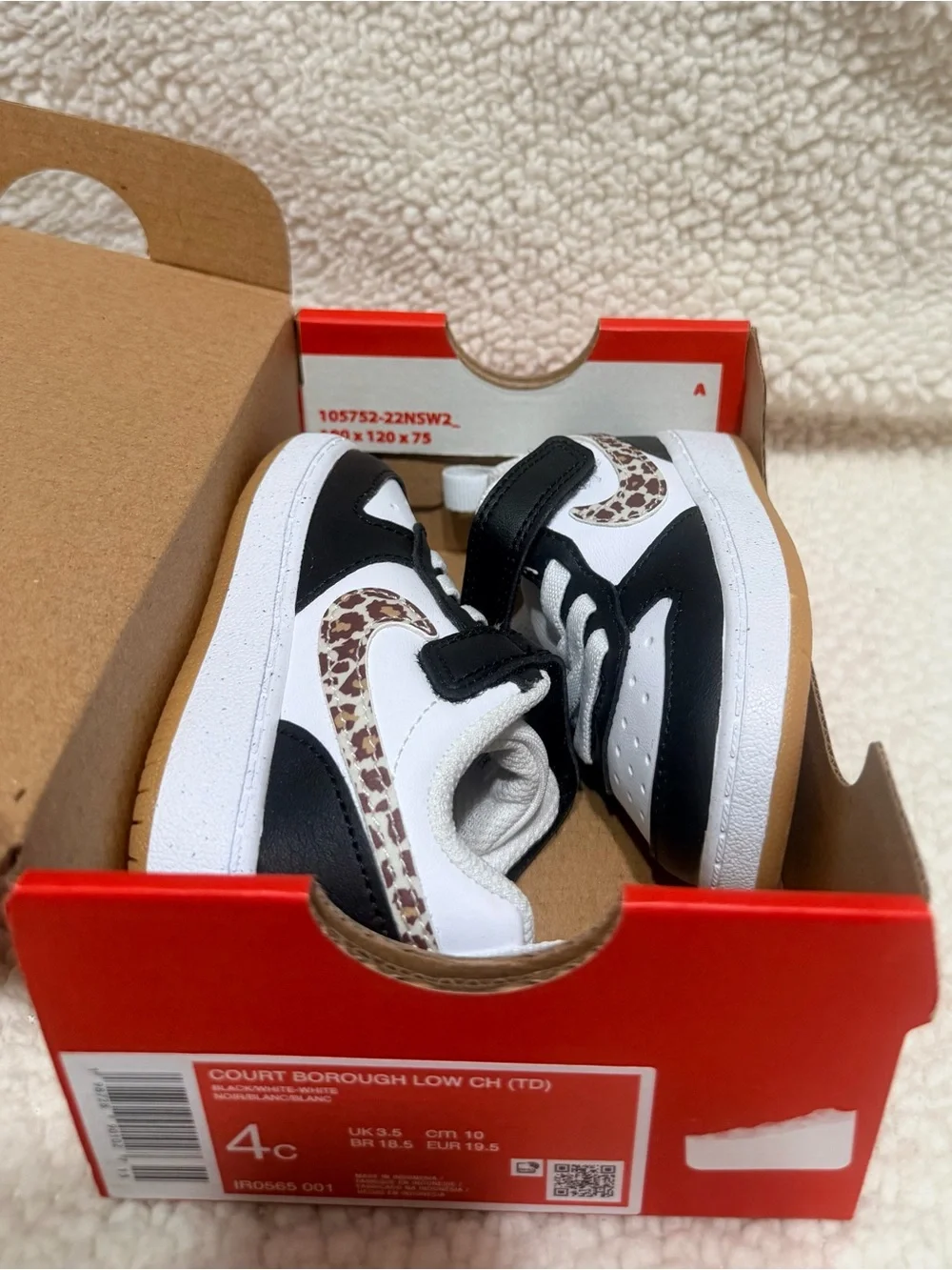 Nike Kids Black and White Sneakers with Leopard-Print Swoosh